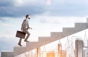 businessman climbing up the stairs