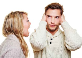 concept of stonewalling with woman yelling and man covering his ears