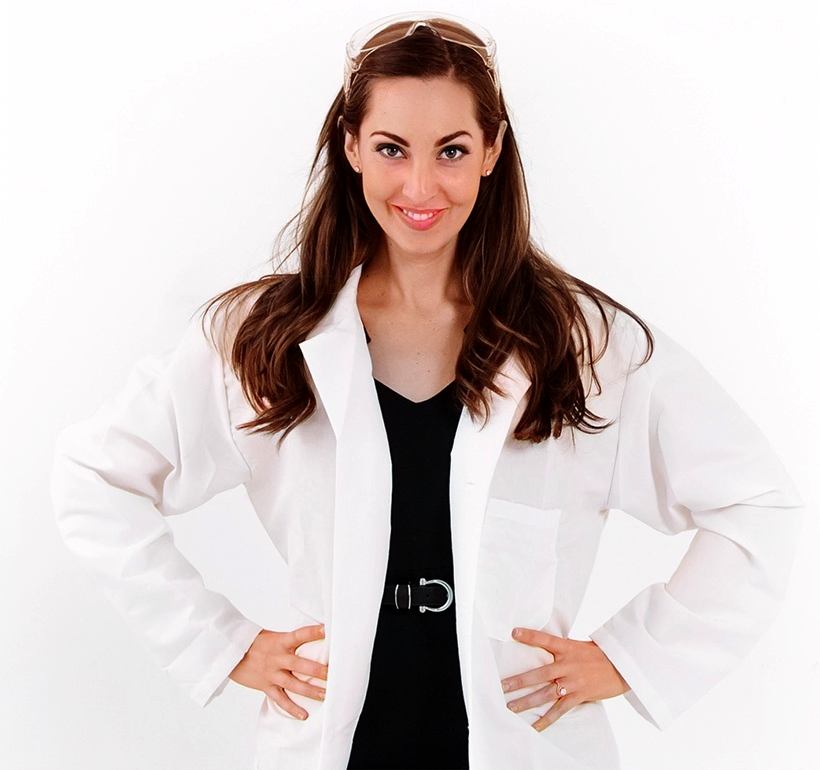 vanessa van edwards in a power pose with a lab coat